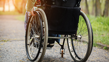 Back view of woman in wheelchair