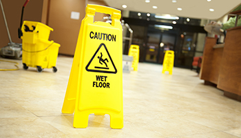 Lobby floor with mop bucket and 