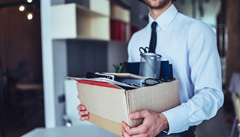 Businessman with carton box